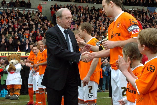 Adam shakes hands with Jimmy Armfield on the day the stand name in his honour was opened, before Blackpool drew 2-2 with Crystal Palace