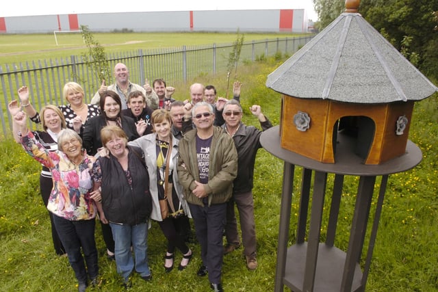 Blackpool Community First along with representatives from St George's High School with a new dovecote which has been built