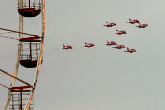 Red Arrows against the setting of the Big Wheel in 2006