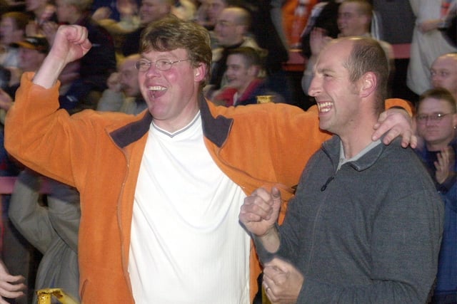 Blackpool Football Club fans watch their team beat Hartlepool to gain a place in the play off finals on a giant screen at Bloomfield Road in 2001