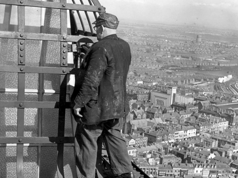 There's not a hard hat in sight for this brave chap painting away almost at the very top of Blackpool Tower