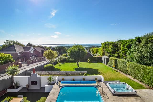 This is Rathgar. A four bedroom home in Portsdown Hill Road, Bedhampton, that is on sale for £1.19m. It is listed by Fine and Country.