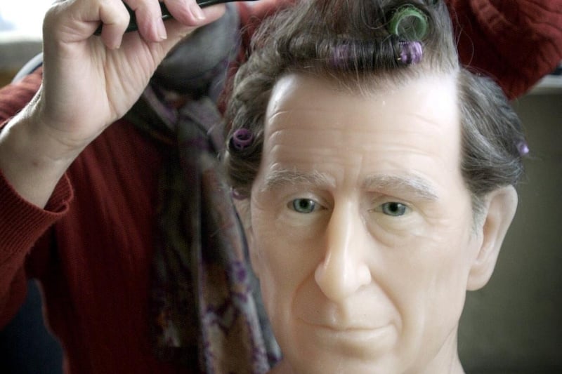 The finishing touches added to the new Prince Charles waxwork in 2002