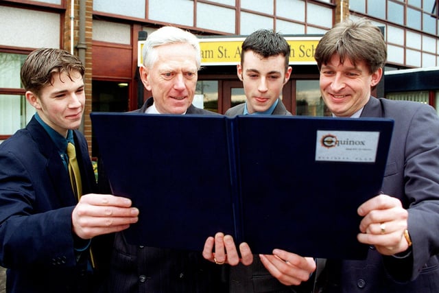 Lytham St Annes High School sixth formers set up their own enterprise company and launched it by handing a copy of their business plan to the school's headteacher in 1998
Pictured left to right are Alan Watson (Financial Director), Head Michael Payne, Alex Feseto (Marketing Director), and Head of Sixth Form Ian Phillips.