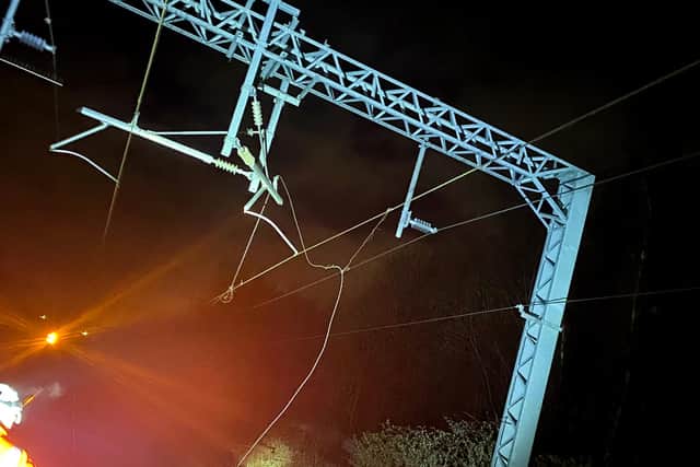 Network Rail said a vandals threw a log into the path of an oncoming train near Bolton, damaging a Northern train and a 25,000 volt overhead electric cable which powers trains. The damage has caused disruption on the line between Preston and Manchester today (Tuesday, March 15). Pic: Network Rail