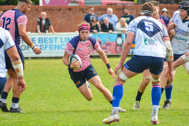 Lancashire's Ben Turner runs at the Yorkshire defence Photo: Andy Sowden