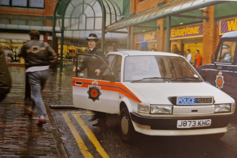 Police react to reports of bombs in the town centre in 1992, but it was a hoax