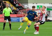 McNeill played and scored against Michael Appleton's then Lincoln side in the EFL Trophy last season.