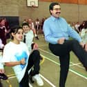 Sponsored aerobics in the sports hall at Montgomery High School, Blackpool, to raise money for Romania. Headteacher Paul Moss struts his stuff