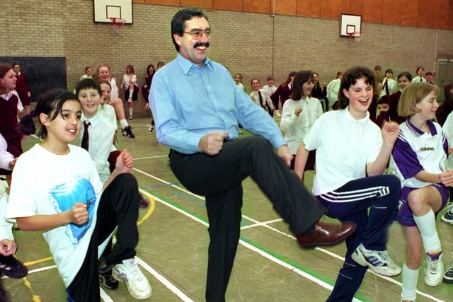 Sponsored aerobics in the sports hall at Montgomery High School, Blackpool, to raise money for Romania. Headteacher Paul Moss struts his stuff