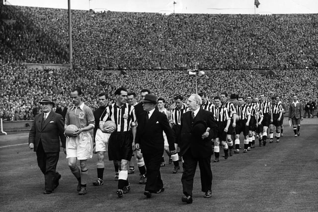 Captains Johnston and Joe Harvey lead out Blackpool and Newcastle United FC for the 1951 FA Cup final at Wembley Stadium. Newcastle won the match 2-0 and Jackie Milburn scored both goals.