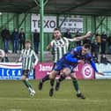 Luke Charman, tries his luck with a flicked on header. Photos: Steve McLellan