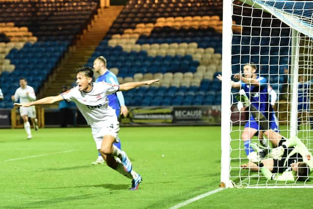 Taelor O'Kane equalises in stoppage time for AFC Fylde at FC Halifax Town  Photo: STEVE MCLELLAN