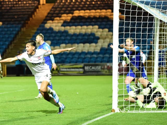 Taelor O'Kane equalises in stoppage time for AFC Fylde at FC Halifax Town  Photo: STEVE MCLELLAN