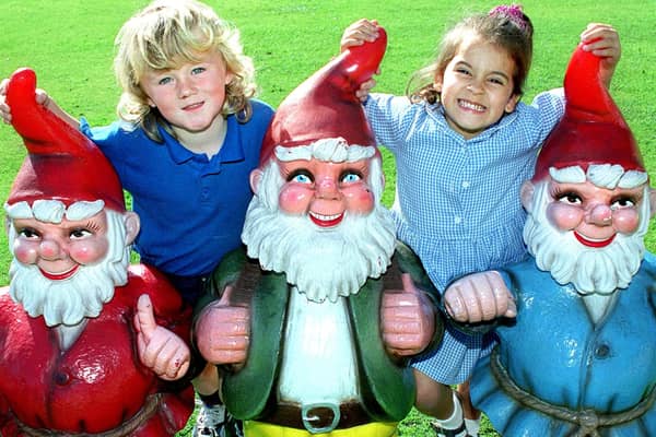 Cricketland Pre-School Nursery in West Park Drive, offered their three gnomes to the highest bidder, to raise money for Derian House. Pictured are Edward Lyttle and Tania Alvarez-Yates