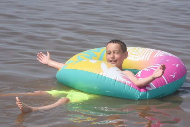 Mark Reid, 11, cools off in the sea off Blackpool