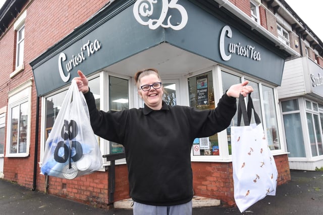 This popular afternoon tea venue is located on Layton Road, Layton. The great value, big portion sized options and welcoming atmosphere at CuriosiTea@23 make it a hidden gem outside of the town centre. 
Sue Seddon from CuriosiTea@23 is pictured in this photograph with meal packs that she put together to help vulnerable people during lockdown.