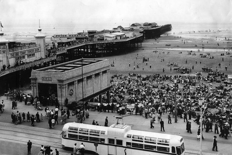 Central Pier, beach and lifeboat house in 1962. Tommy Trinder show advertised on the pier