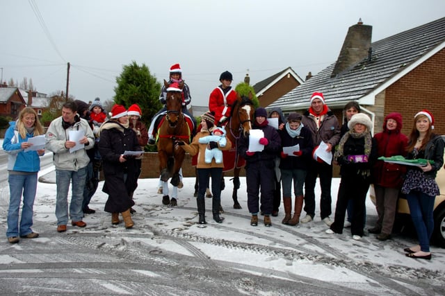 Carol singers on horseback at Newton-with-Scales