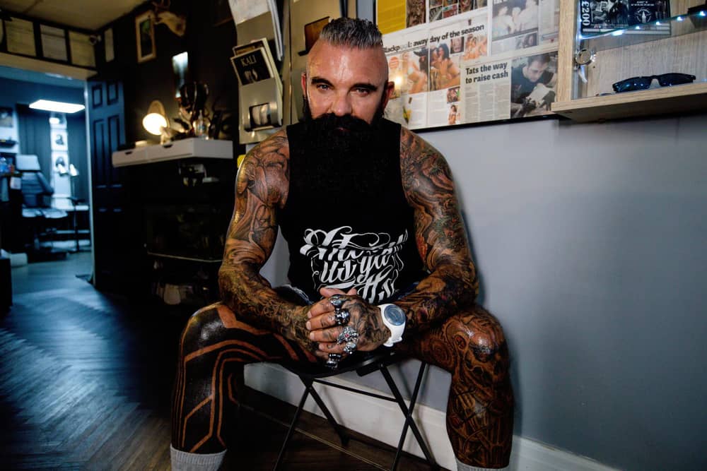 Peter — a passionate tattoo collector, wearing his life story through his tattoos. Photo: Adam Spencer Young.