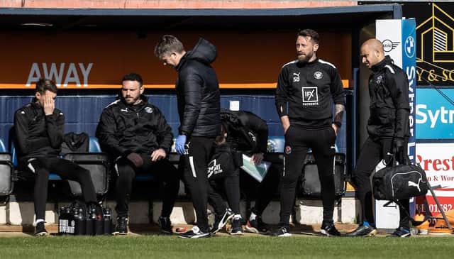 Stephen Dobbie has the job until the end of the season, but who will get it long-term?