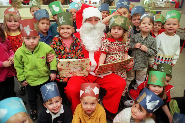 Sheffields oldest Santa, William Lindley (84) with children at bracken hill nursery in 1998.