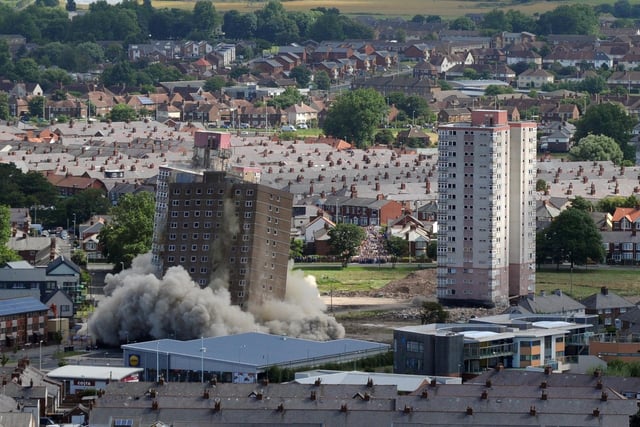 This photo was taken from the top of a building for a distanced view of the tumbling towers