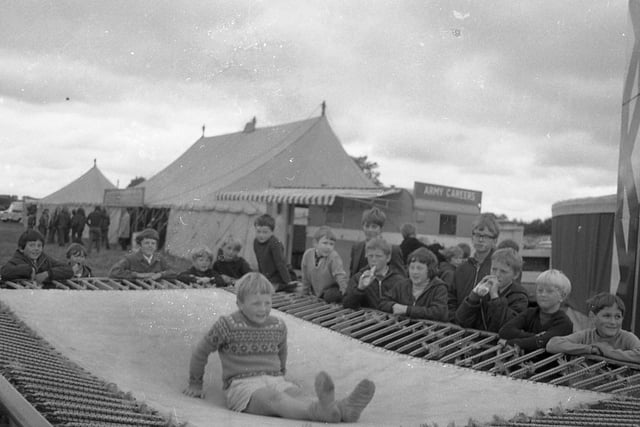 A dull and cloudy start to Garstang and District Agricultural Society's 158th annual show in 1971 meant attendances were well down. Despite this the crowds were still entertained, like this young chap enjoying a turn on the trampoline