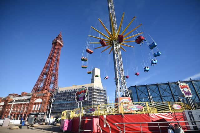 Blackpool Tower will light up blue (pictured alongside Star Flyer ride)