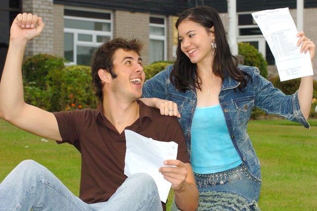 A Level results day at Blackpool Sixth Form College. Dara Loy (18) and Iain Thornley (18) celebrate their exam results in 2005