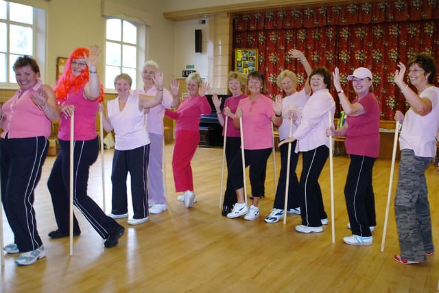 Members of the Rosemary Conley diet and fitness club at Lytham Methodist Church held a 'pink' day to raise funds for Breast Cancer Care. Pictured: The girls try their hand at pole dancing