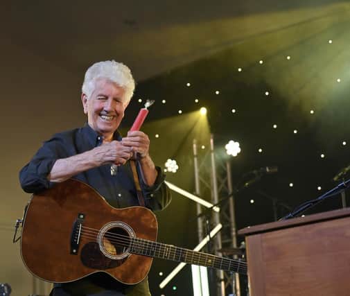 Graham Nash was presented with a stick of Blackpool rock on stage at the Festival. Picture: Dave and Darren Nelson.