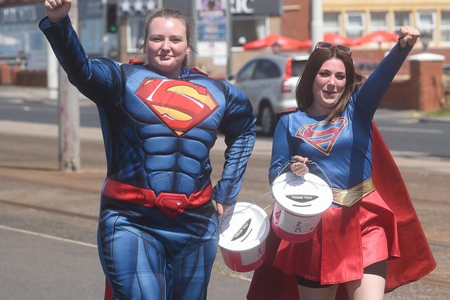 Super heroes in the hotel trolley dash for charity