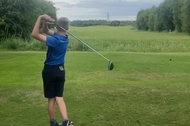 Jacob Stock, 12, on the golf course