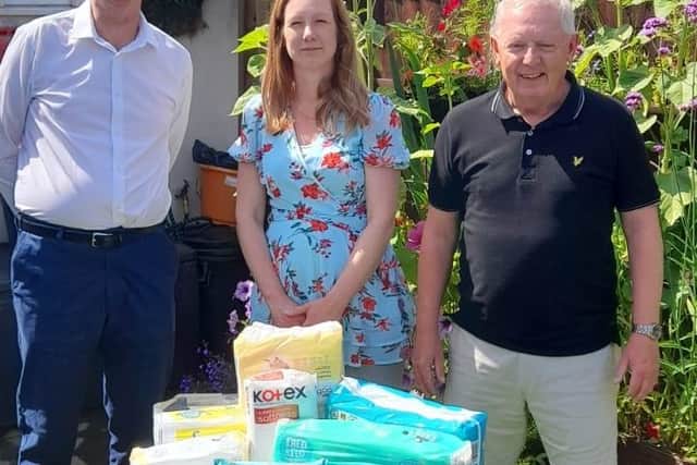 Picture shows Coun Martin Mitchell, Melanie Kelly, and Layton House manager Pete Mercer