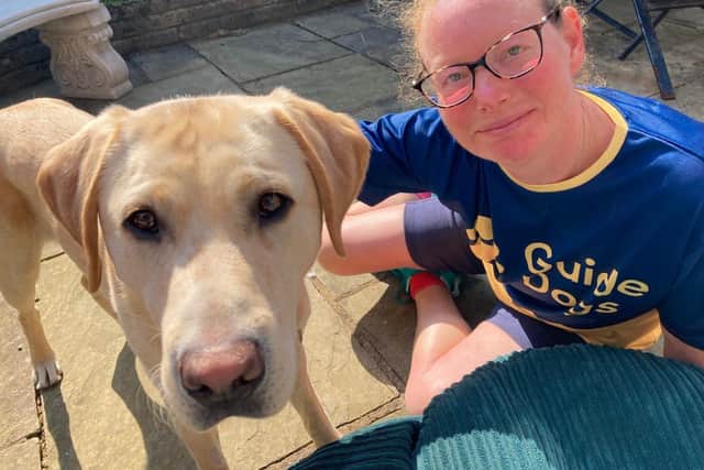 Sarah has been puppy raising future guide dog Ernie, a yellow Labrador.