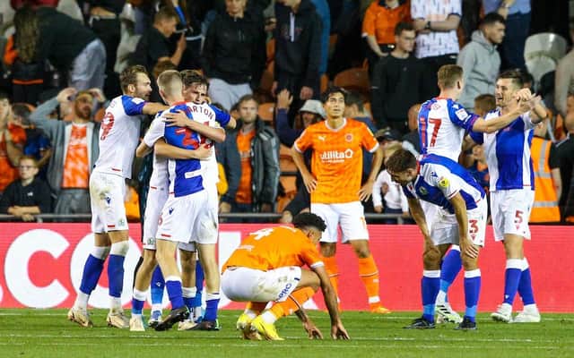 Blackpool's players show their dejection at the full-time whistle