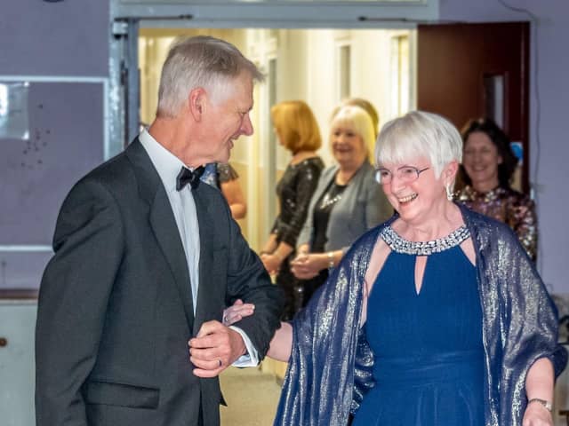 Heather Diggings from the Treales Women’s Institute is escorted by Roger Wordsworth (wearing model’s own) in a party piece to wow the crowds
Pic: David Bradbury