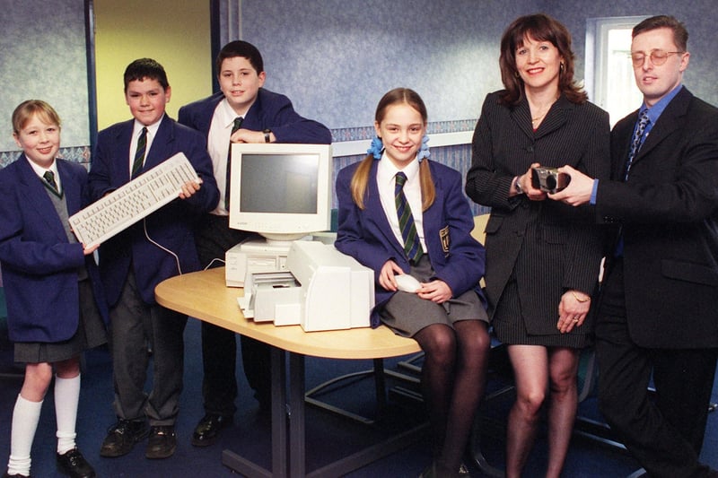 Highfield High School receiving their prize for winning the senior section of Technology for Schools competition. L-R Jennifer Milburn, Thomas Tribick, Sam Workman, Kelly Ann Haigh, Highfield ICT co-ordinator Janet Webster and Western Business Systems sales manager Peter Cross