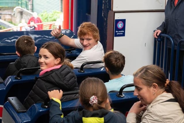 The Ed Sheeran lookalike chats to fellow riders as he rode at the front of The Big One at Blackpool Pleasure Beach