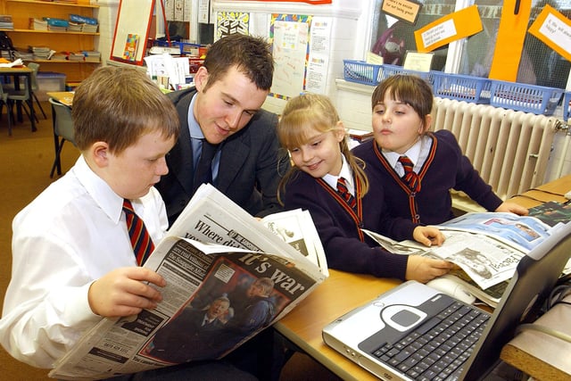 Gazette reporter Andy Sykes talking to children at Waterloo Primary School in Blackpool about life working at a newspaper. L-R are Sophie Fletcher,, Rachel Clarke and Ryan Clarkin