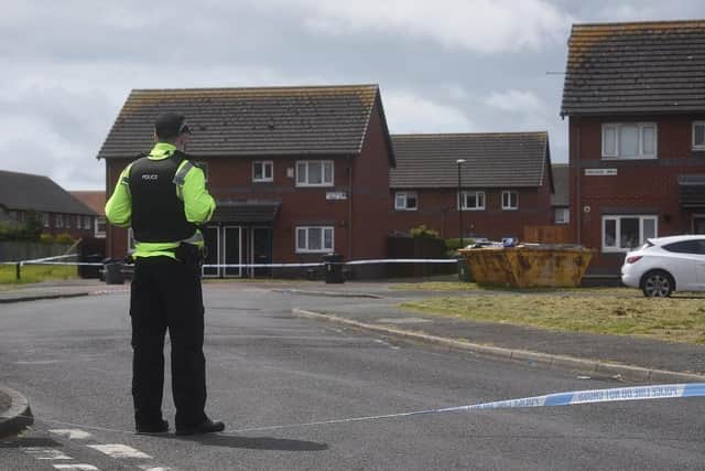 Police at the scene near Westhead Walk, Fleetwood which remains cordoned off after a gunman opened fire in the cul-de-sac last night (Sunday, May 22)