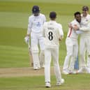 Jimmy Anderson (right) celebrates a wicket with Hassan Ali (Andrew Matthews PA Wire)