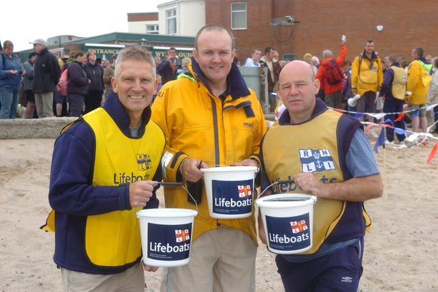 Lifeboat crew Paul Ashworth, Andy Marham and Wreck Trek organiser Steve Carroll, 2003