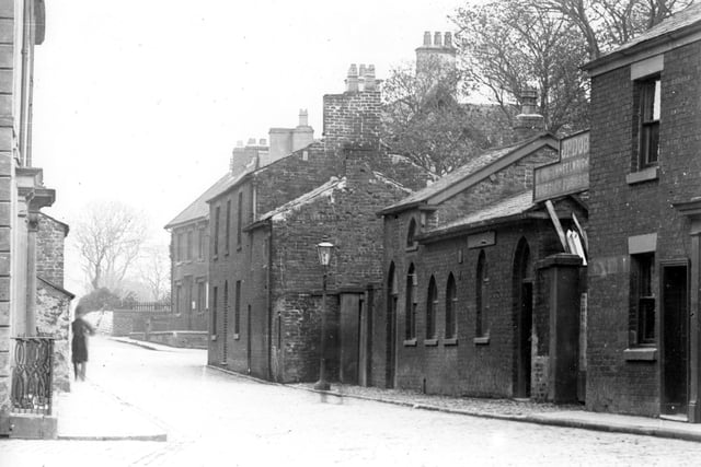 Ball Street before demolition work in 1910 looking towards the junction of Breck Road (left), Chapel Street (right) and Vicarage Road