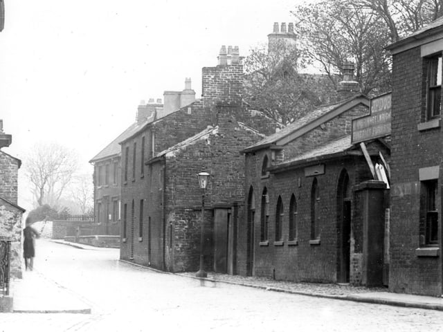 Ball Street before demolition work in 1910 looking towards the junction of Breck Road (left), Chapel Street (right) and Vicarage Road