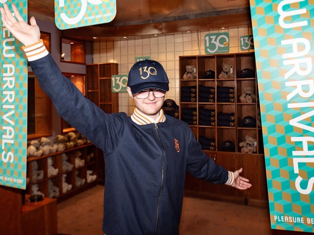Daniel Hughes, a retail and marketing assistant, wears some of the brand new 130 year anniversary clothing range at Blackpool Pleasure Beach store.  Lucinda Herbert