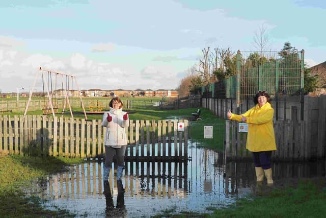 Coun Joanne Gardner and Coun Karen Henshaw pictured in January 2021 when they were inspecting the waterlogging at Blackpool Road North Playing Fields, St Annes. Significant drainage works have now been carried out at the park in a bid to stop the flooding problem.