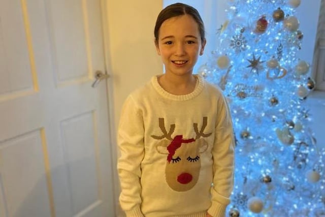 Izzy-Bo, age 9, celebrates Christmas Jumper Day.