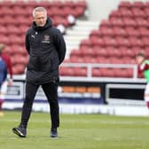 NORTHAMPTON, ENGLAND - MAY 01:  Blackpool manager Neil Critchley looks on during the pre match warm up prior to the Sky Bet League One match between Northampton Town and Blackpool at PTS Academy Stadium on May 01, 2021 in Northampton, England. (Photo by Pete Norton/Getty Images)